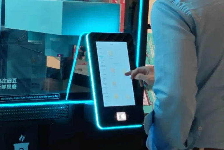 robot coffee kiosk advertising screens revenue from traffic